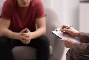 person on couch talking with therapist about borderline personality disorder treatment program