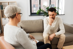 a client talks to a therapist during outpatient mental health treatment santa ana